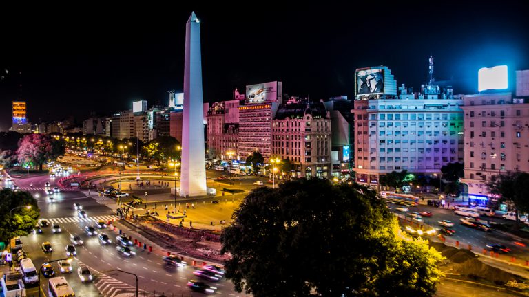 The night lights shine on the beautiful Obelisco de Buenos Aires. The night lights shine on the beautiful Obelisco de Buenos Aires.